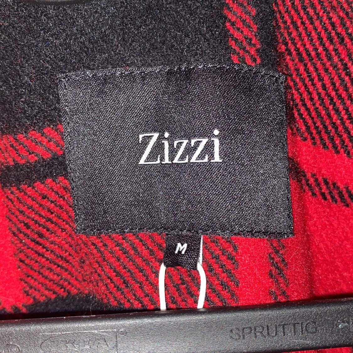 En kappa från zizzi  med prislapp kvar. - 91