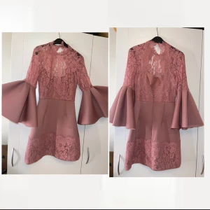 Klänning - Säljer min klänning som jag använde 1-2 gånger. Den är i nyskick . storlek 34-36 