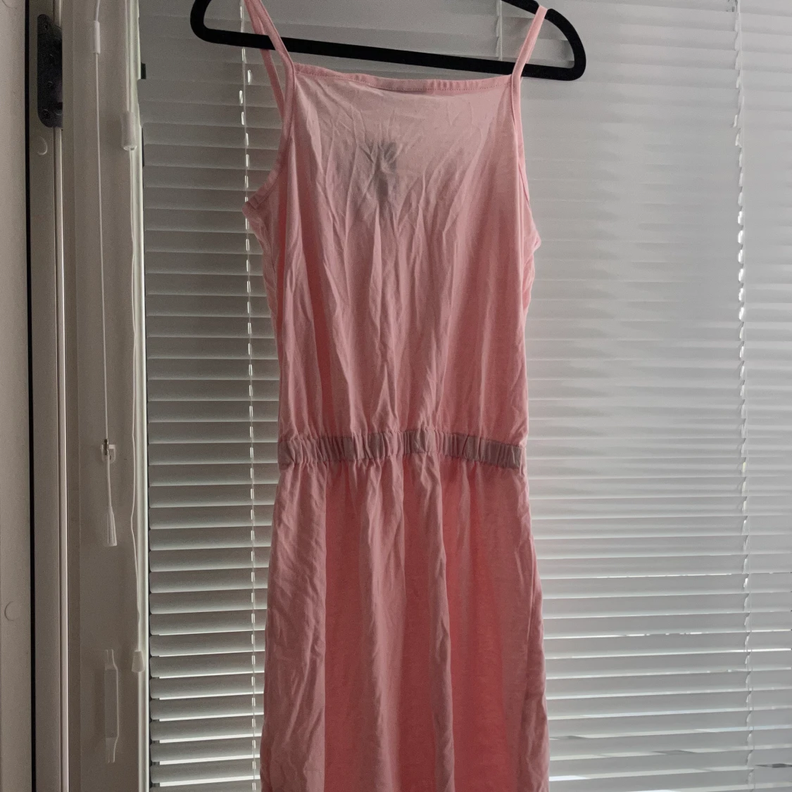 Oanvände jumpsuit med snörning vid midjan i storlek S - 90