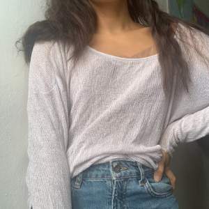 Loose beige knit top from brandy and Melville