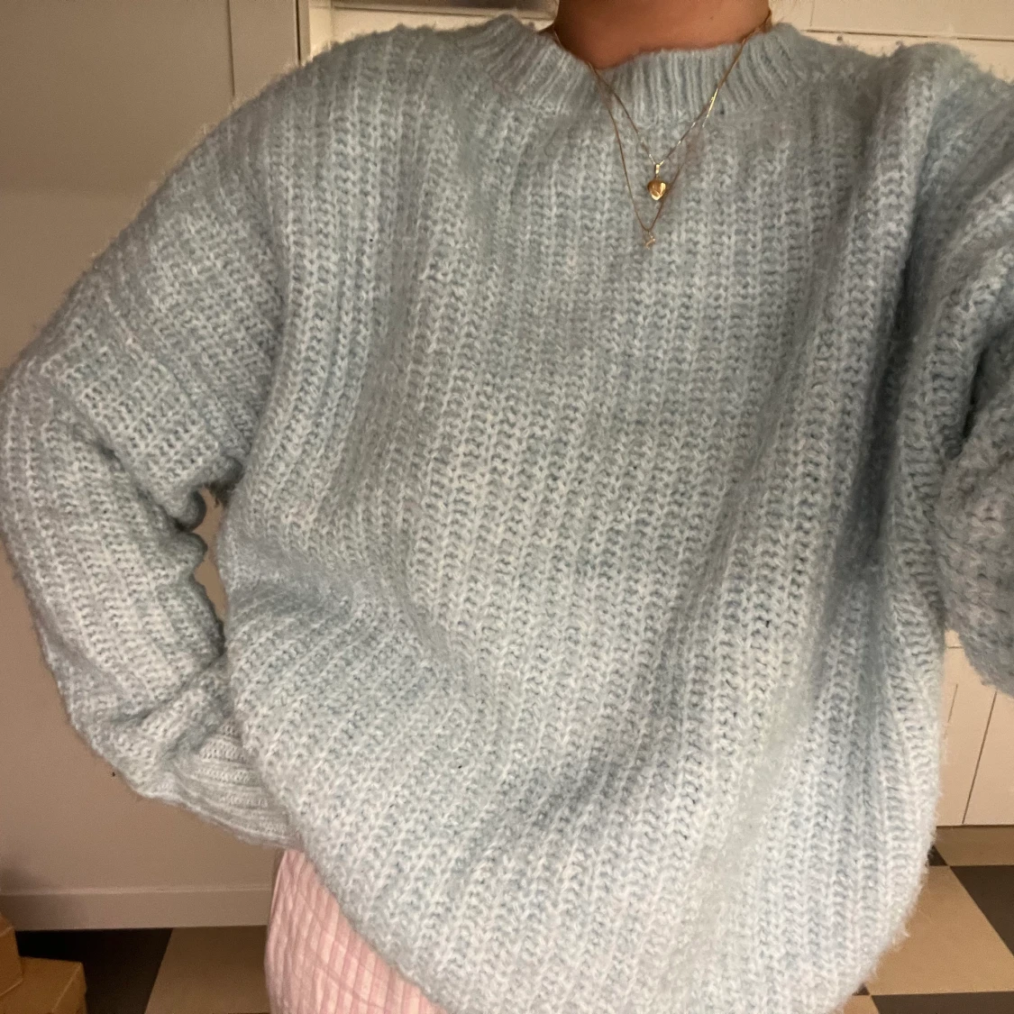 Ljusblå stickad tröja