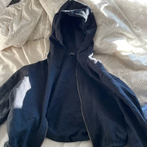 Svart kofta  - En svart kofta ifrån even & odd 