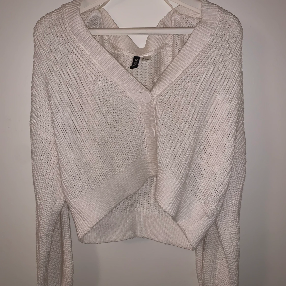 Stickad V-ringad tröja - 90