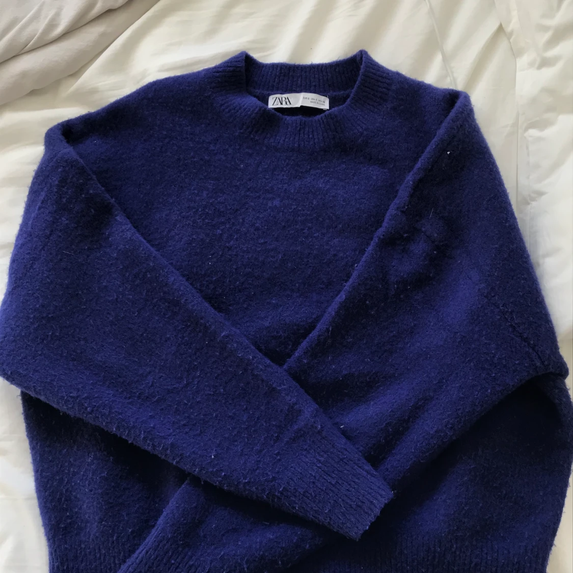 Blå stickad tröja - 90