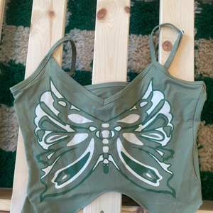 Fjäril linne  - Fjäril linne i stl XS / S  Använd en gång 