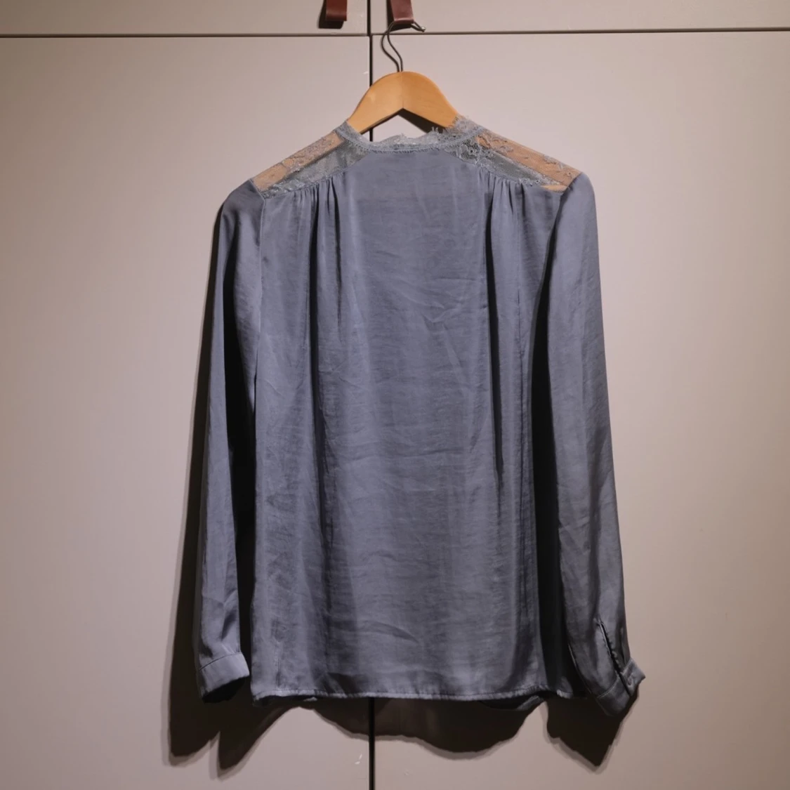 Blue silk blouse with lace on shoulders - 90