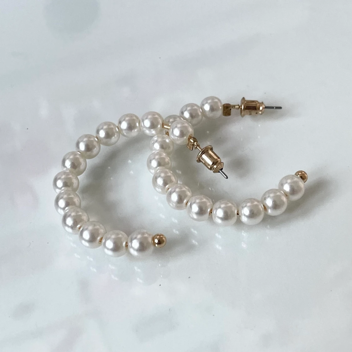 Örhängen med pärlor