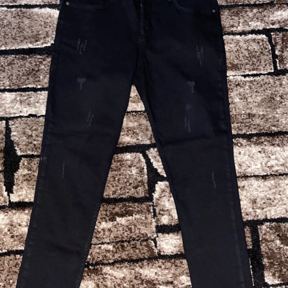 svarta herr jeans