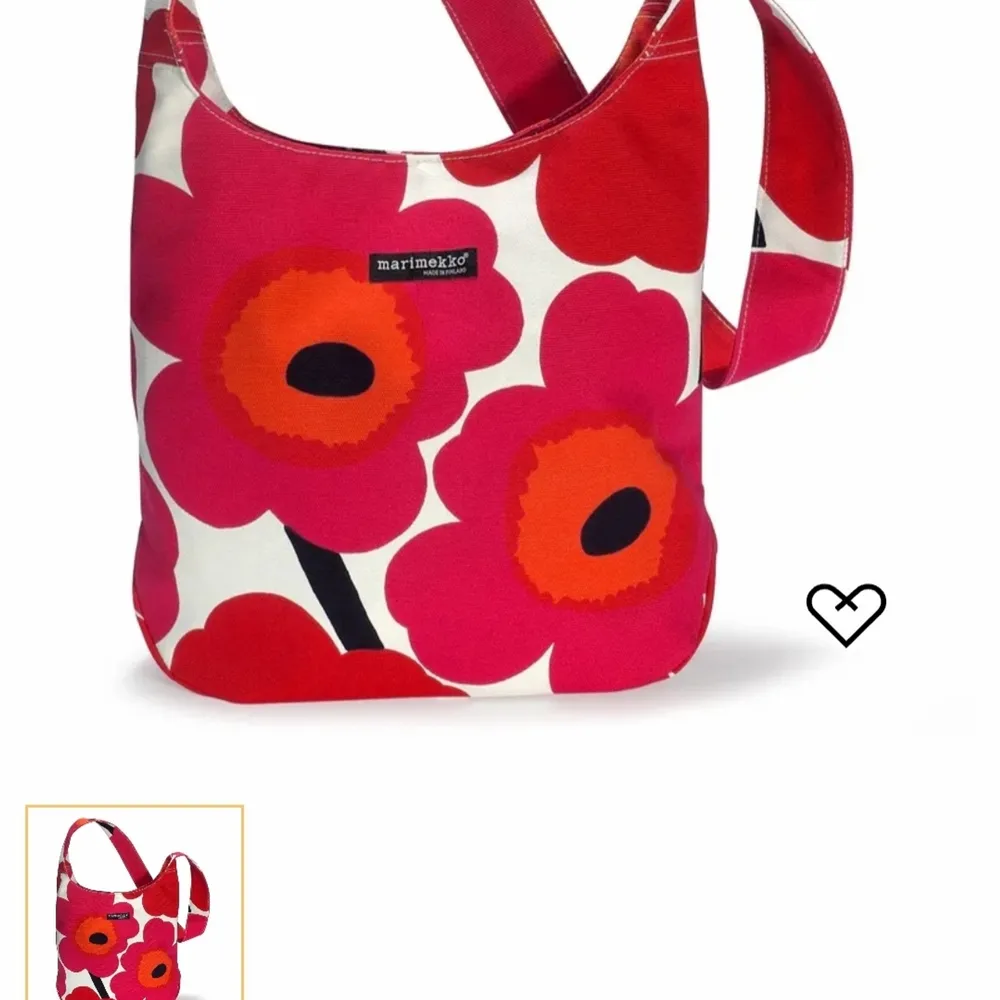 Knappt använd Marimekko blommig/röd väska . Väskor.
