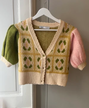Knitted cardigan - Never worn! Still in store-bought condition.   Perfect for the spring:)