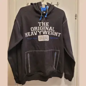 Size M lightly used and decent condition black hoodie. With words 
