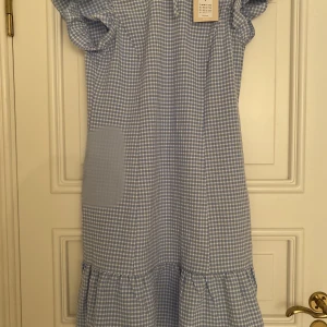 Blå gravidklänning - Blå helt oanvänd gravidklänning.