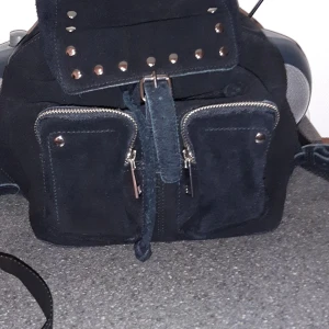 Ryggsäck  - Nunoo ryggsäck. Använd 1 gång 