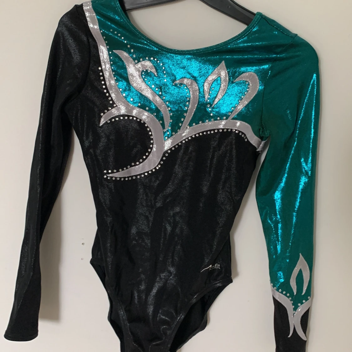 Grön gymnastikdräkt