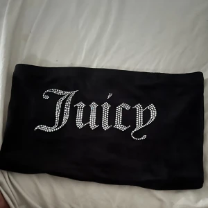 Black Juicy Couture bandeau/boob tube - Never been worn but no tags. Perfect condition. Stretchy material fits M-XL