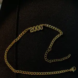 Sött fotarmband guldpläterad år 2000. Tål vatten  