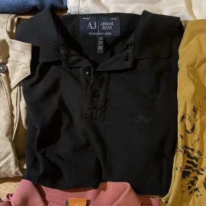 Svart Armani Polo-shirt - Ny oanvänd 