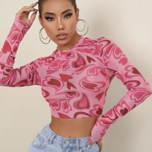 Topp - Oanvänd mesh material  Jag har E kupa och den slutar några cm under bysten 