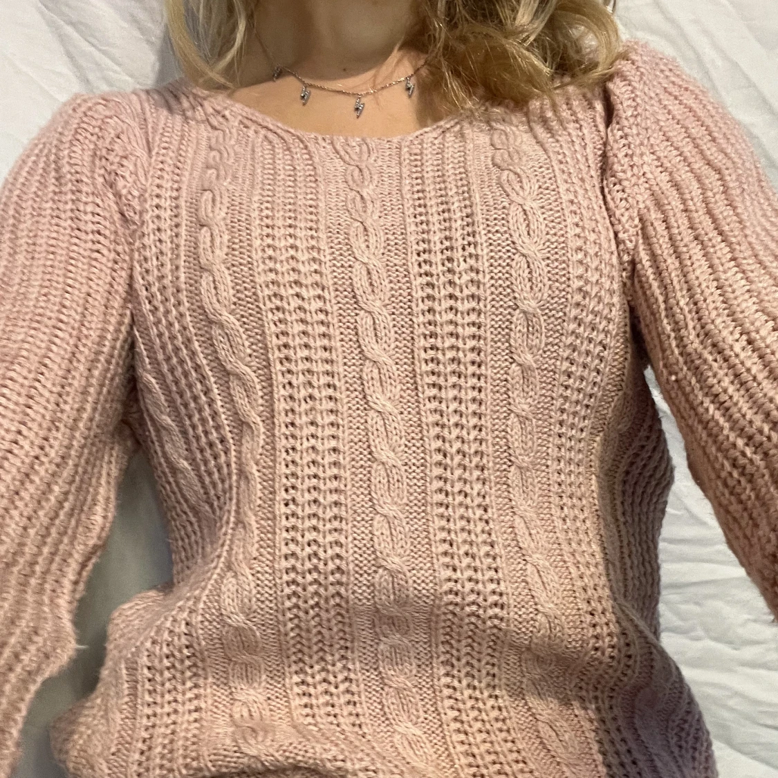 Rosa stickad tröja