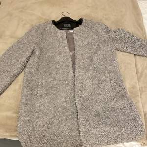 Soul river jacket in light grey witha teddy fur. Fits size M. In good condition looks classy.