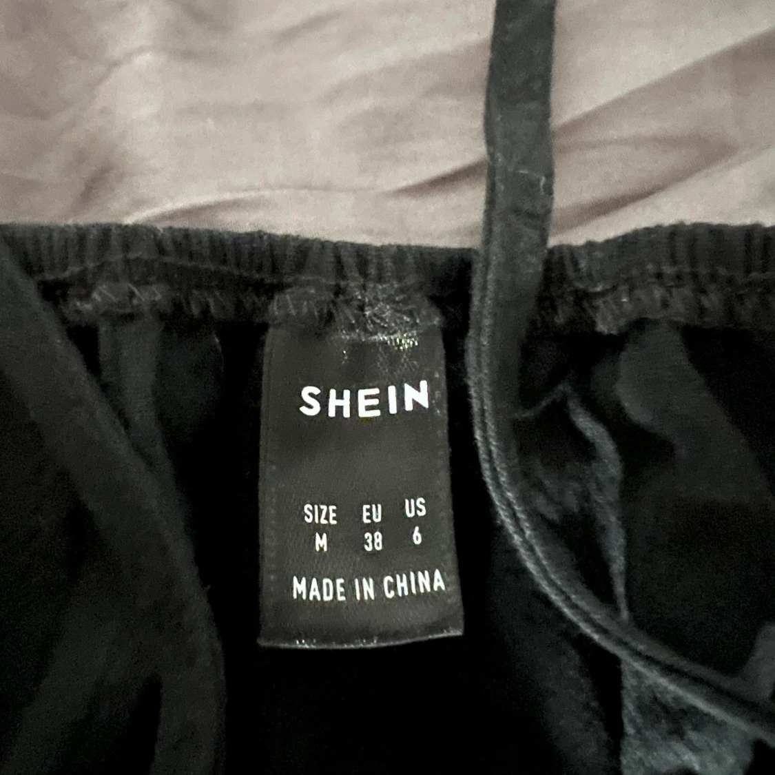 Svart halterneckklänning - 90