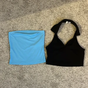 Toppar - En blå topp från vero moda och en svart från h&m. Aldrig använda och i nyskick. Skriv privat för fler bilder!:) 20 styckpris, 30 för båda. 