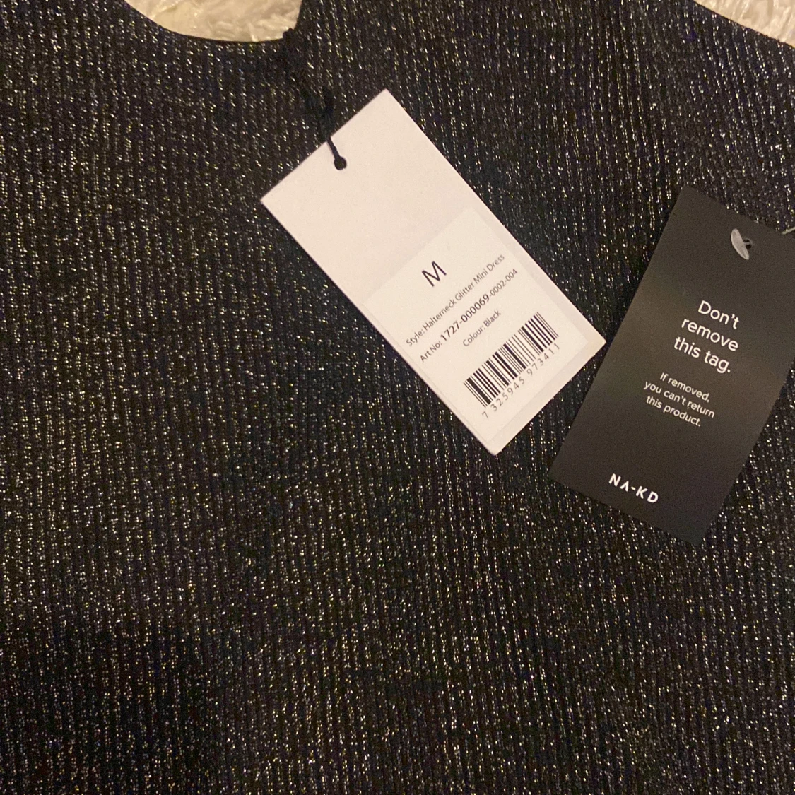 Svart glittrig halterneck klänning  - 90