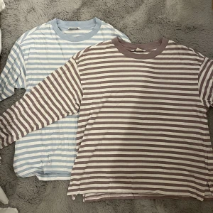 Tröja - Långärmade tröjor ifrån Monik. 1 för 50, 2 för 85. Den blå är i xs och sne lila i S men dom är nästan lika stora