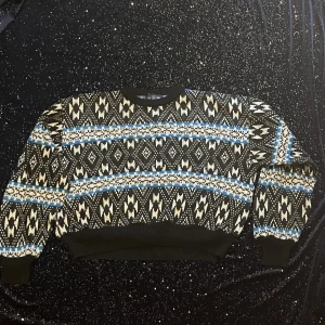 knitted sweater - quite knitted sweater, it’s a tiny bit itchy but an undershirt easily solves that, otherwise comfy and sits nicely 