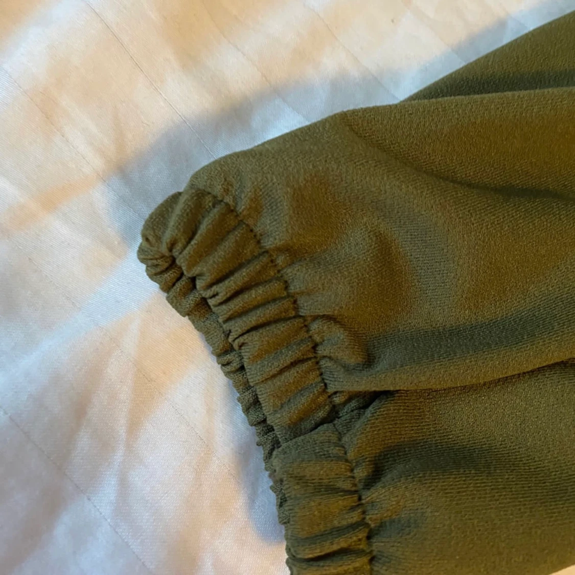 Olivergrön tröja i str S - 90