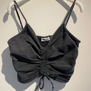 Weekday linne  - Aldrig använt svart/grått linne från weekday.  Storlek 38/M, går att justera knytningen där fram