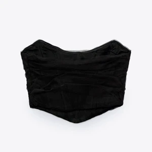 Korsett topp - Jättefin svart korsett topp, slutsåld från Zara i storlek S.