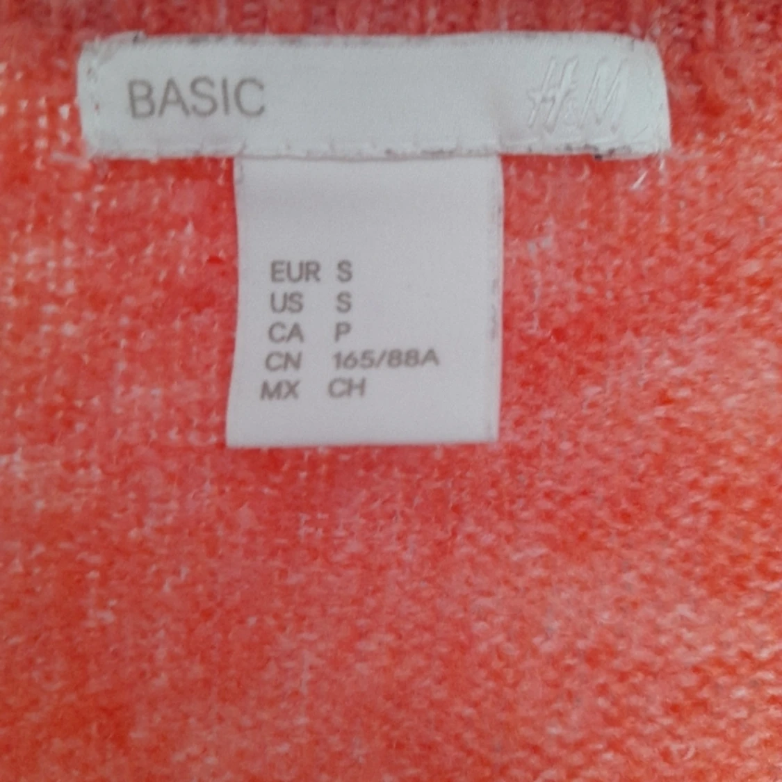 Stickad rosa tröja - 91