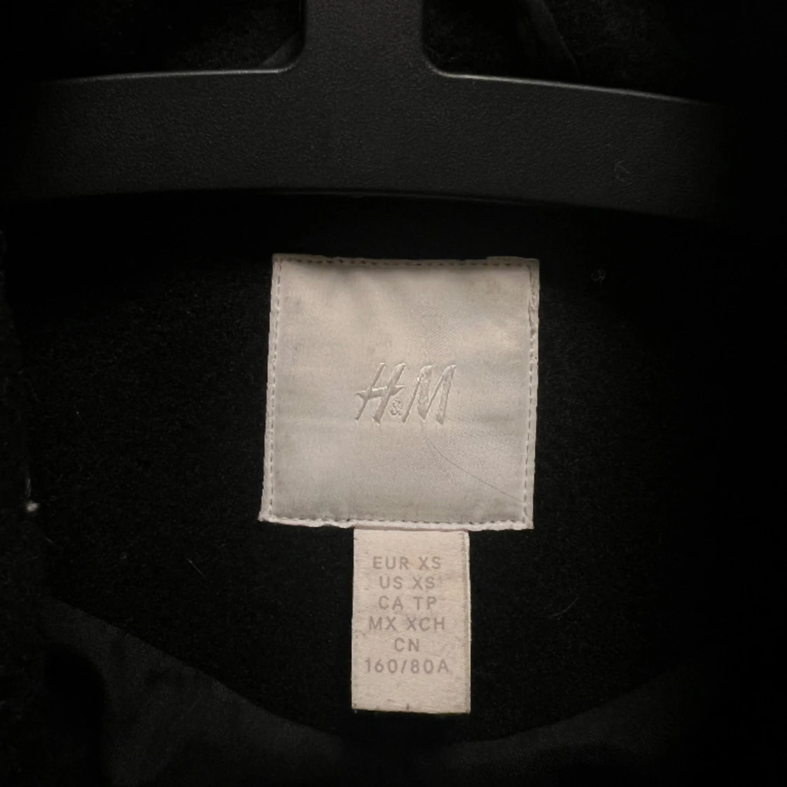 Svart oversize kappa - 90