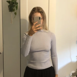 Ljusblå tröja  - Aldrig använd 