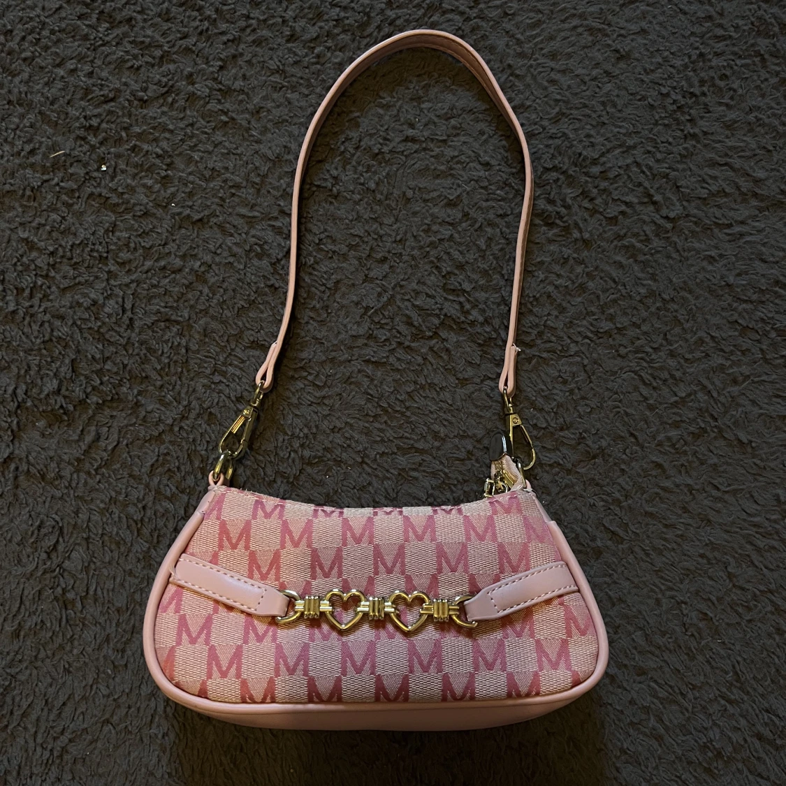 Liten rosa gullig väska