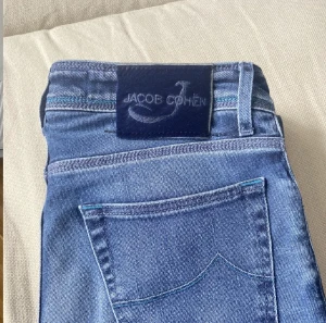 Jacob Cohën jeans - Säljer nu ett par Jacob Cohën jeans i super bra skick, inga defekter. Storleken är 30 och modellen är 622. Hör av er vid fler funderingar :)