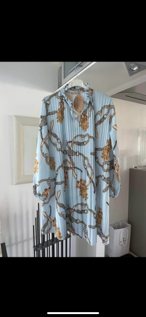 Klänning Lo-Ika  - Ny med prislappen kvar  Onesize