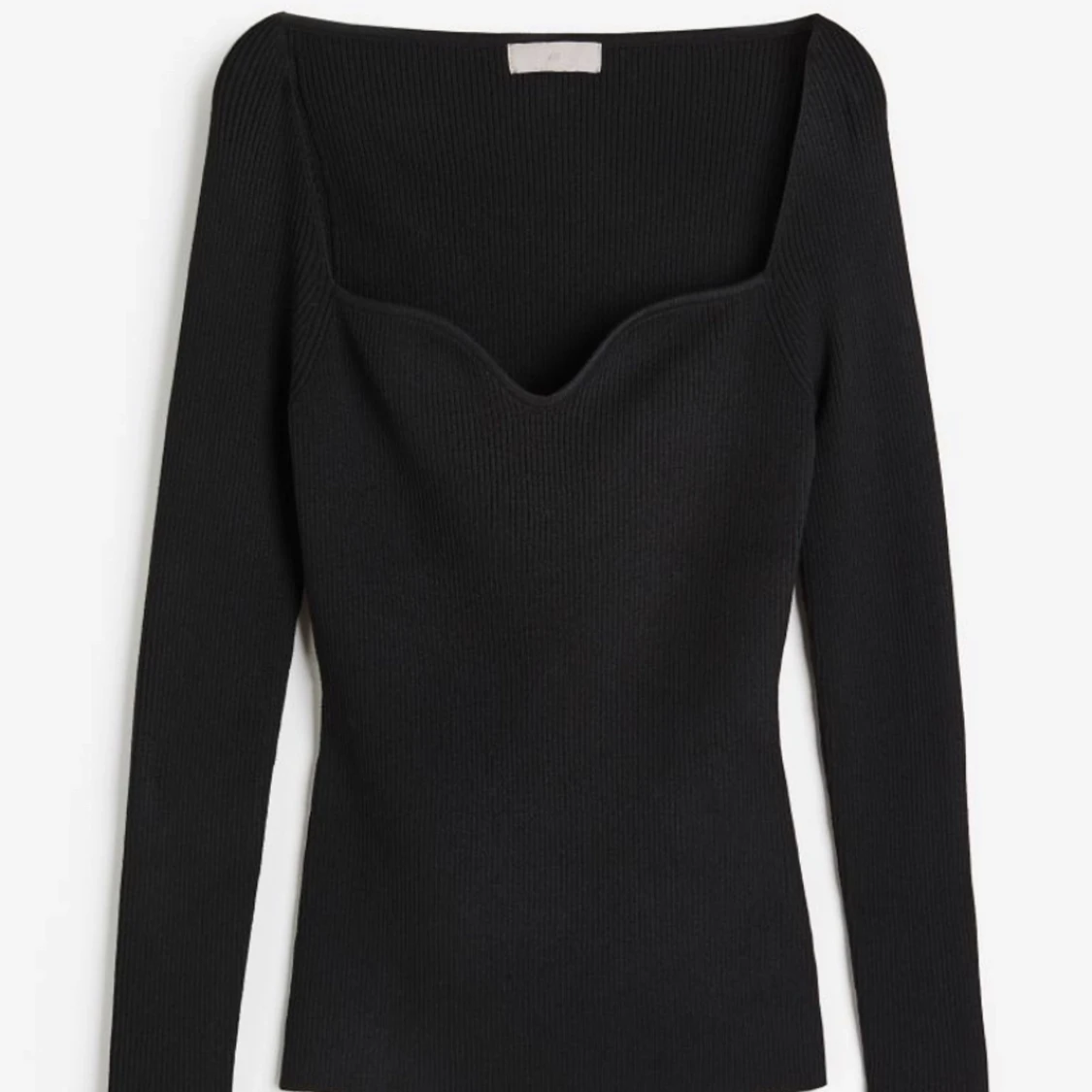 Ribstickad tröja med utsvänga armar - 91