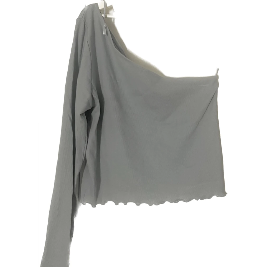 Ljusblå one shoulder tröja