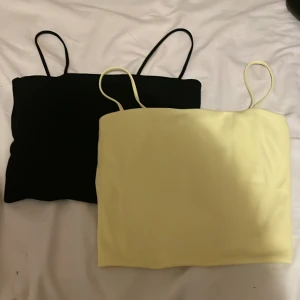 Enkel toppar  - Två st enkeltoppar i svart och gul och är som nya. Båda kostar tillsammans 100 kr❤️