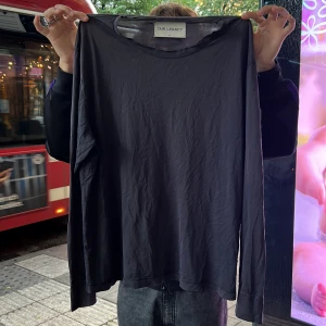 our legacy dark gray/black long sleeve - jätte bra piece men kommer inte till användning (PRIS KAN DISKUTERAS) 