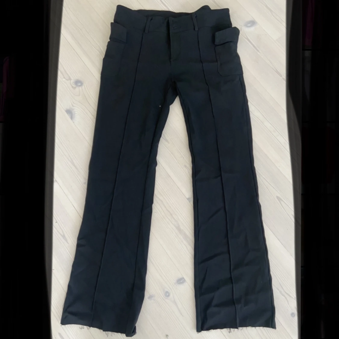 Lågmidjade svarta kostymbyxor 