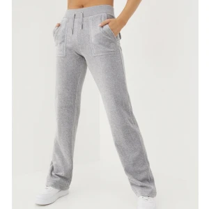 Juicy byxor  - Säljer nu mina gråa juicy couture byxor då dem inte används längre.Använda fåtal gånger så därav som nya förutom att metall plupparna på snörena har åkt av i tvätten.