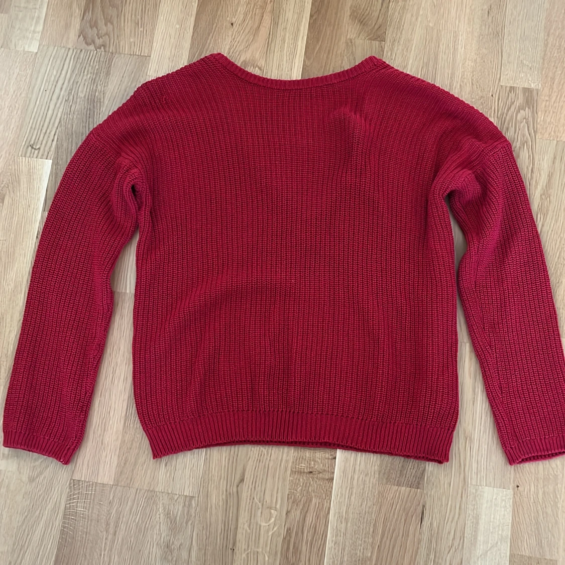 Stickad tröja, V ringad rygg