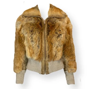 Pälsjacka  - En äkta pälsjacka i fint skick för sin ålder. Passar S-M, men ger gärna mått då jag inte är säker på storleken. 