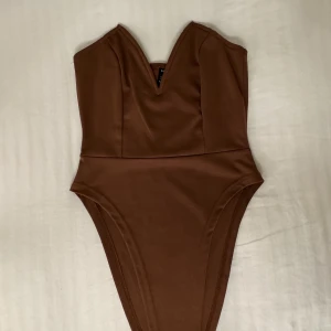 Korsett body - Super snygg korsett body, aldrig använd