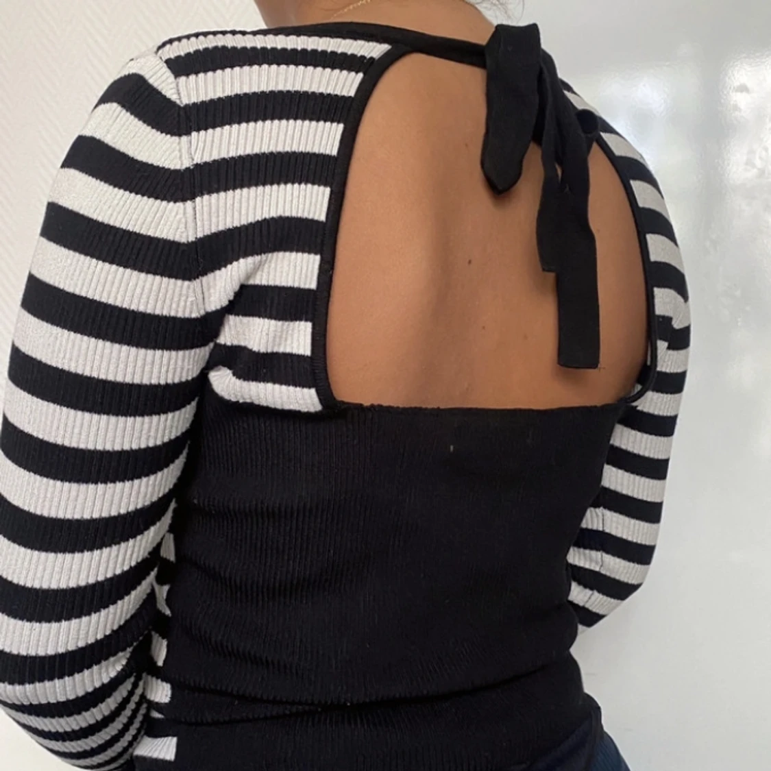 Topp med öppen rygg