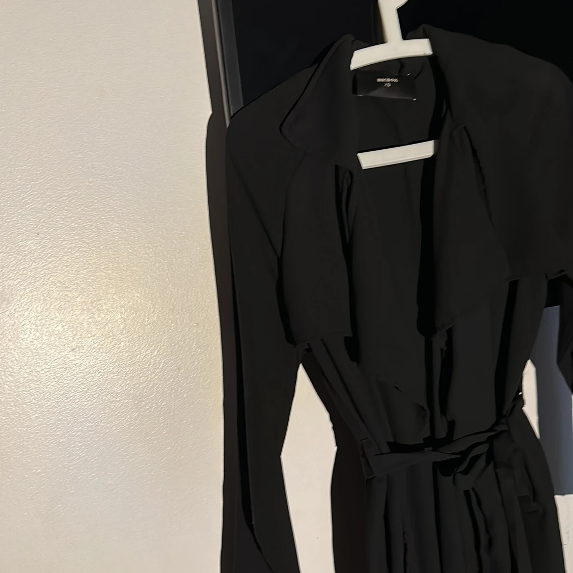 Svart trenchcoat  - 91