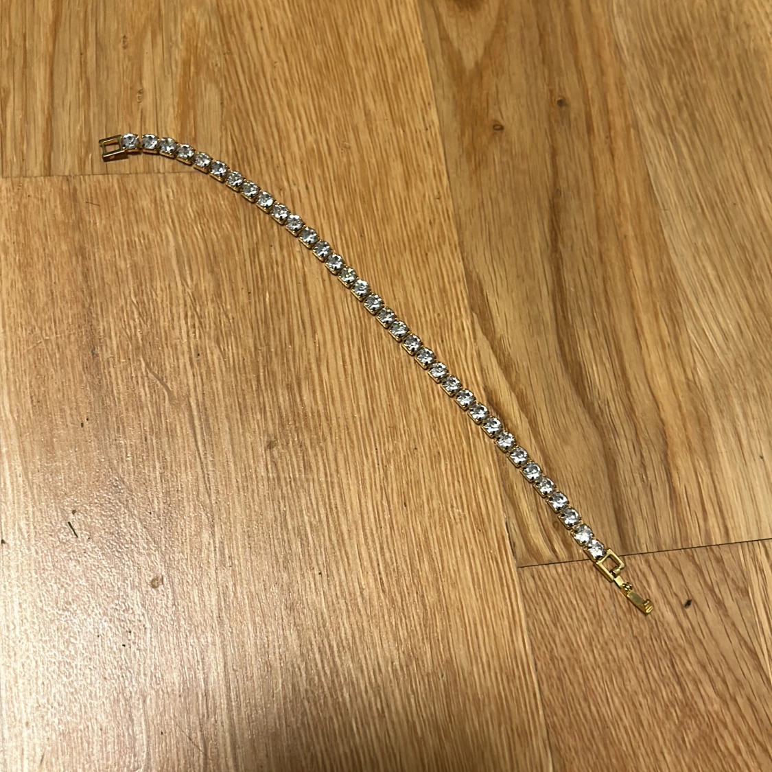 Guldarmband men vita stenar - 90